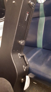 Really nice guitar case I bought in NY for the ride home containing my acoustic Ibanez guitar.